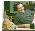 Nic Papalia of Western Australia Dingo Association Incorperated, pictured with the family pet Dingo.