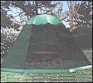 Umbrella tent which fits snugly over your shade umbrella. This particular one available from WA Show Pet Supplies